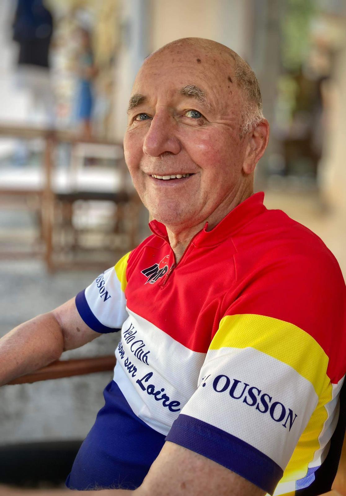 Geoff smiling in his cycling club jersey